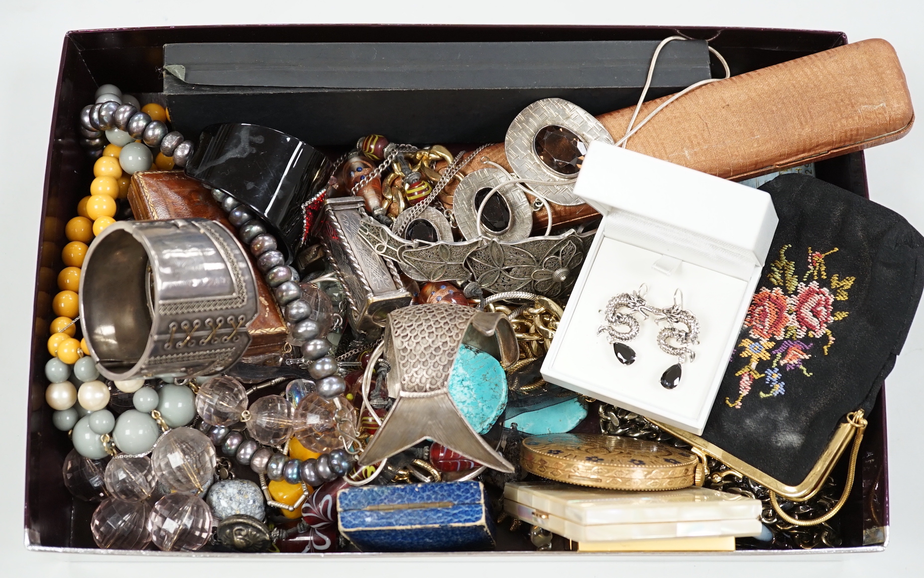 A group of assorted jewellery and white metal items etc., including filigree compact and bracelet, lipstick holder, Mexican sterling fruiting vine bracelet and Norwegian sterling ring.